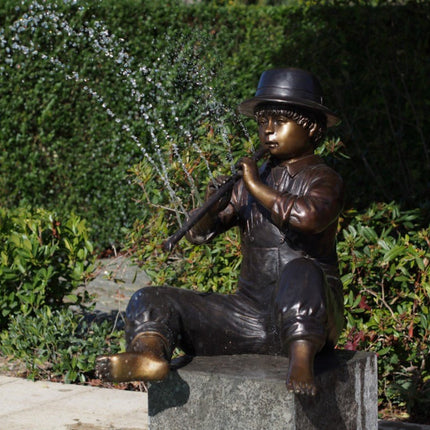 Bronzen beeld Jongen met blokfluit 70x64x68cm 25kg - Doika - Bronzen beeld - Doika - 5410807610671 - PB61067